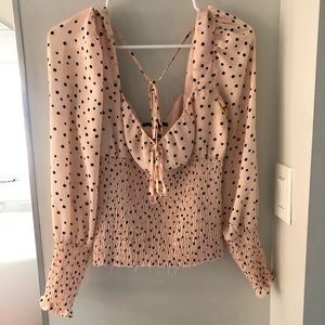 Pink and black polka dot top